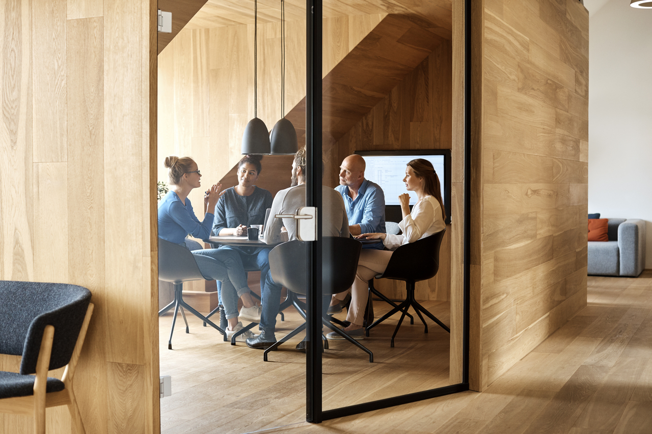 People having a meeting in a conference room