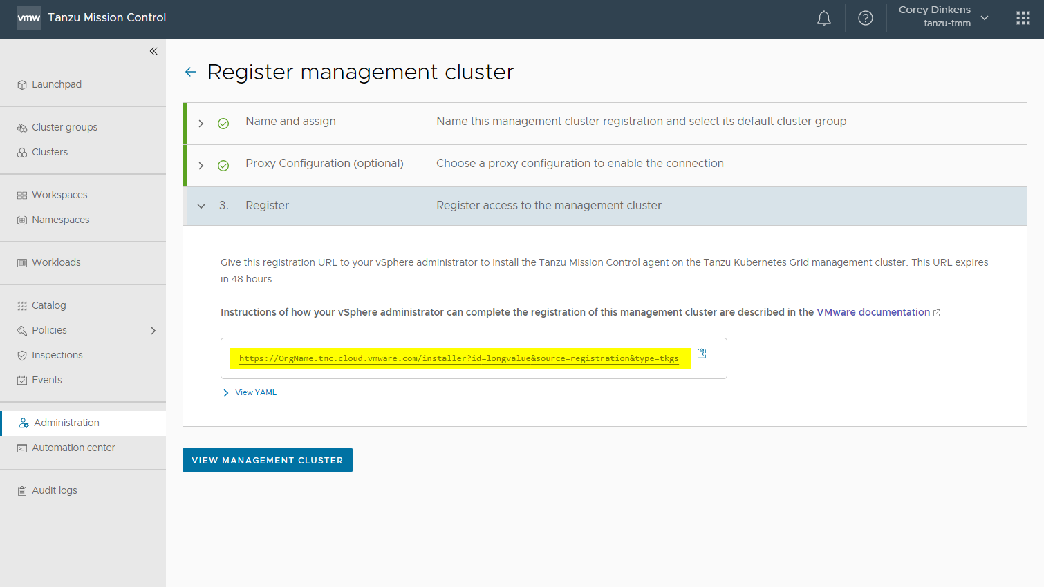 Screenshot showing how to find the registration URL for a management cluster in Tanzu Mission Control