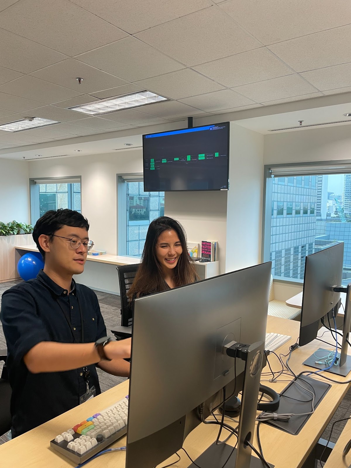 Enablement through pairing on the work, at the Tanzu Labs office in Singapore.