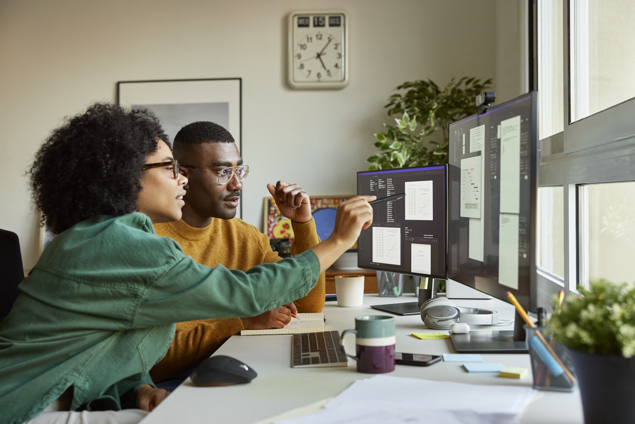 2 designers reviewing work together