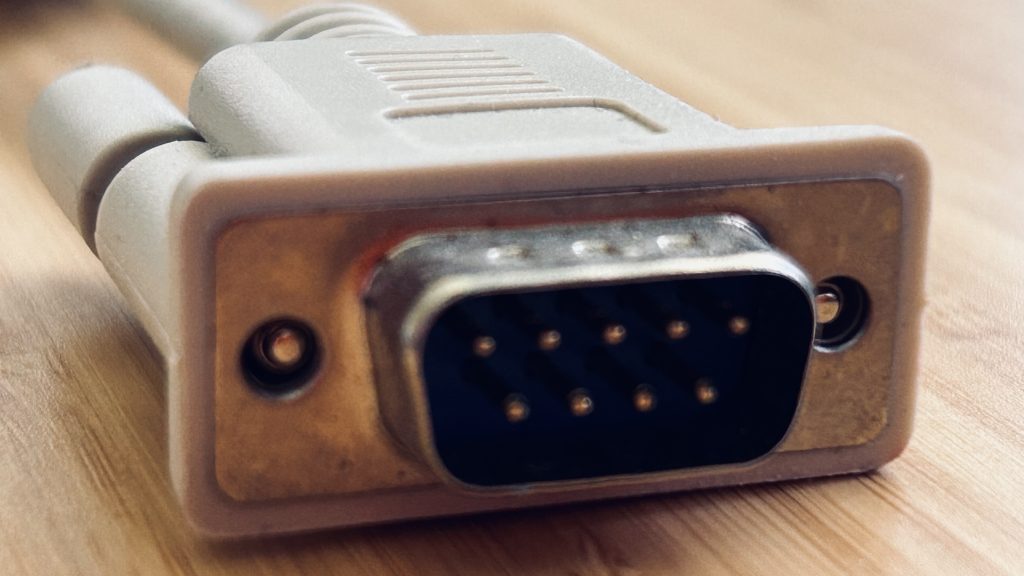 DE-9M connector, representing virtual serial ports supported by ESXi-Arm