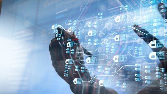 Blockchain technology concept with diagram of chain and encrypted blocks.businessman hand using tablet computer and server room background