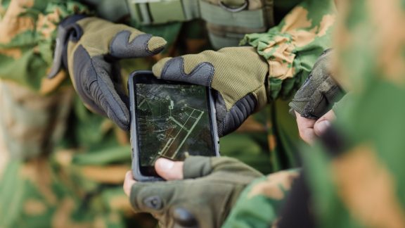 commander of the Rangers paves the route on an electronic tablet