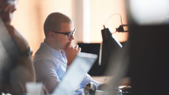 startup business, software developer working on computer at modern office