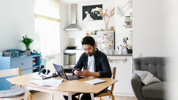 Photo series of japanese man working from home as a freelancer, making conference calls and discussing projects Continuity
