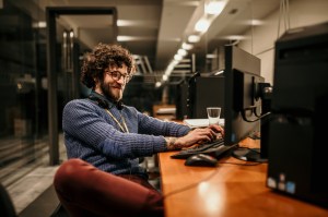 man working at computer