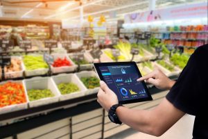 Retail worker using mobile device management system