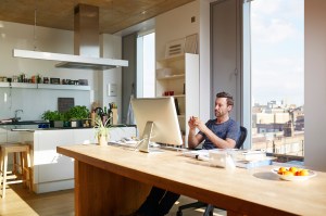 man working from home with Mac