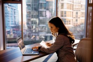 Female working at laptop in an office