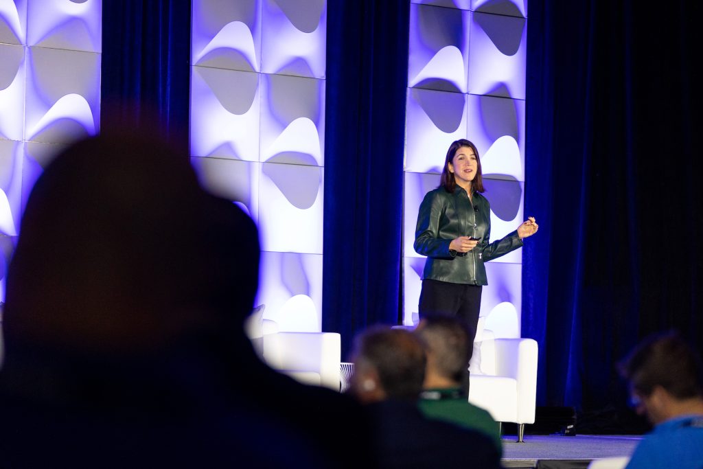 Laura Heisman, standing on stage at VMware Explore 2023 Las Vegas