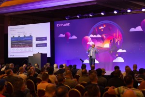 Speaker on stage at session VCFB1651LV in VMware Explore 2024 Las Vegas. Slide presentation is on Virtual Cloud Foundation