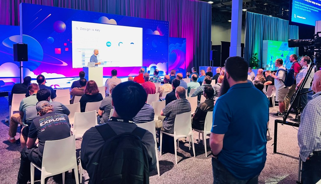 Speaker on stage at Quick Talk session