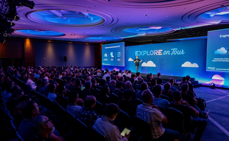 Explore on Tour Branded Interior Plenary Session Speaker and Audience learning about VCF