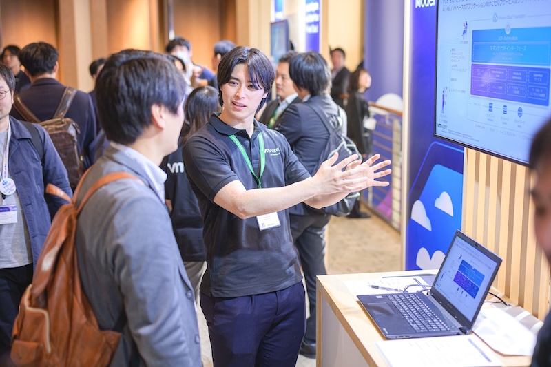 Attendee networking with SME at Explore on Tour in Tokyo