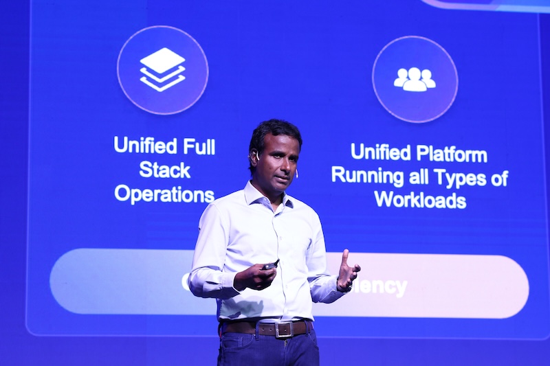 Speaker on stage at VMware Explore on Tour in Mumbai