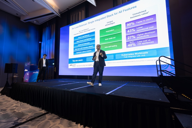 Speaker on stage at VMware Explore on Tour in Singapore