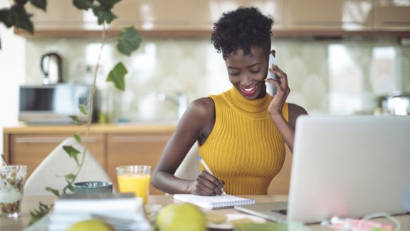 Young woman working at home