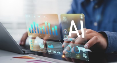 AI content creation tools: Man uses laptop with AI assistant for graphic design, translation, chatbot, image creation, coding, and advertising.