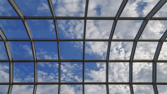 glass roof sky clouds