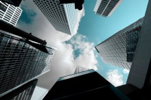 Looking up at skyscrapers