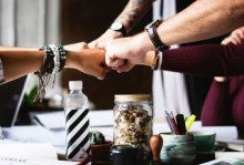 Team members fistbumping