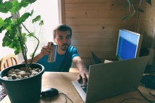 Remote user with plant and coffee