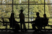 VMware employees in silhouette